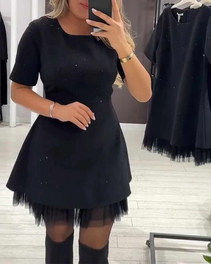 Elegantne kleit koos kaunistustega