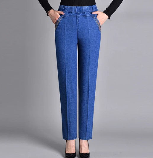 Naiste teksad küljetaskute ja elastse vöökohtadega