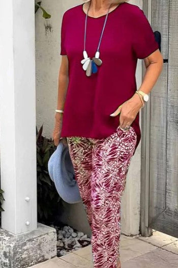 Kaheosaline kostüüm kaunite pükstega