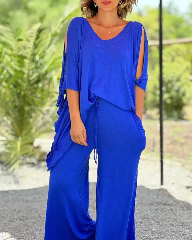 Lõdva tegumoega kaheosaline komplekt laiade pükstega