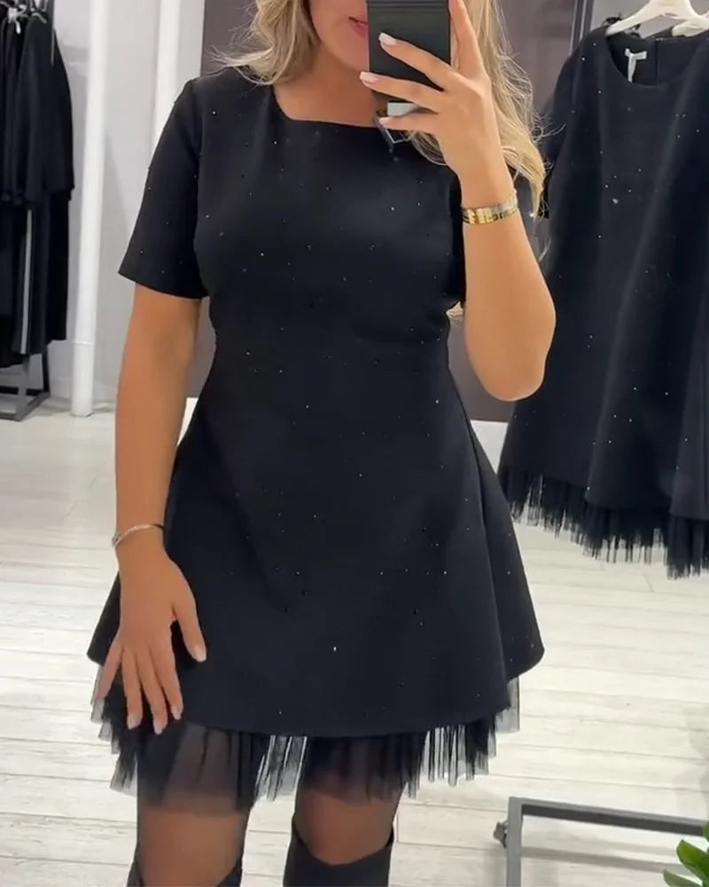 Elegantne kleit koos kaunistustega