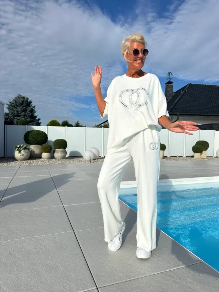 Naiste kaheosaline vabaajakomplekt: pluus ja lahtised püksid